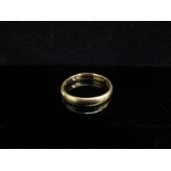 A 22ct gold wedding band, slightly miss-shaped. Size R, 5.
