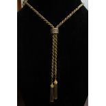 An ornate yellow gold rope chain and white gold box chain twist necklace with diamond set