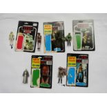 Five vintage Star Wars Return Of The Jedi figures with backing cards;