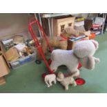 A vintage care wron Tri-ang push along dog,