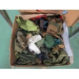 A box of vintage Action Man clothing
