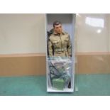 An early issue Action Man Australian jungle fighter figure in jacket, shorts, boots, belt,