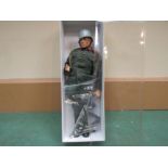 An Action Man German Stormtrooper painted head figure in jacket, trousers,