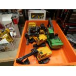 Five unboxed diecast forestry and industrial vehicles including Ertl,