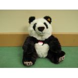 A Steiff 'Manschli' soft filled panda bear,