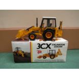 A boxed NZG Models diecast 3CX Excavator Loader