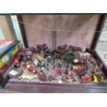 A collection of Britains lead farm figures, implements, horses,