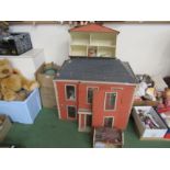 A large dolls house for restoration approximately 75cm tall x 93cm wide x 61cm deep,