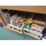 Three boxes of assorted board games and puzzles including Giles, The Party Game,