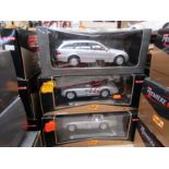 Three boxed 1:18 scale diecast cars to include Mercedes-Benz including Maisto Premier Edition