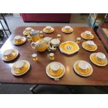 A quantity on Ye Olde English Grosvenor China tea wares including water jug and teapot, yellow,