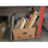 Two boxes containing a quantity of pictures and prints