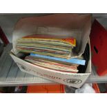 Two boxes of LP's including Beatles and Bob Marley,