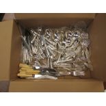 A box containing a quantity of silver plated cutlery and bone handled knives