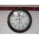 A metal cased Victoria Station, London wall clock,