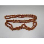 An amber necklace, 60cm long