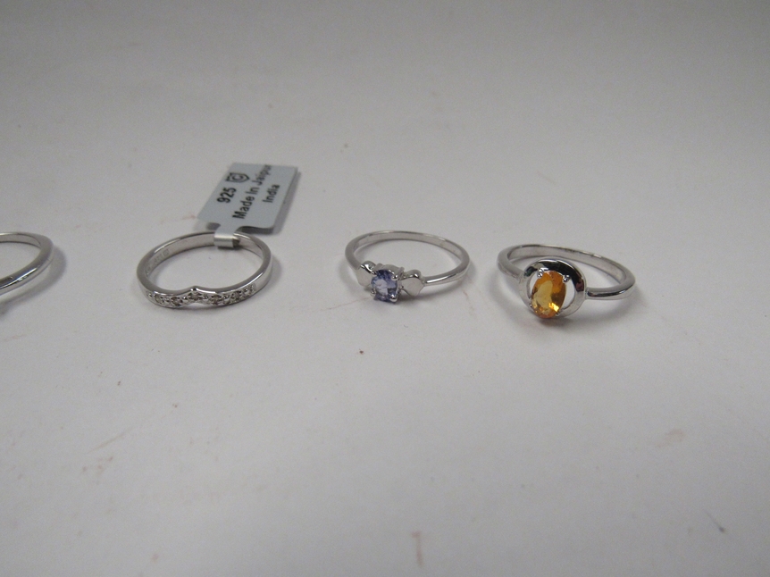 Six Sterling silver rings including Tanzanite, fire Opal, diamond, yellow sapphire, blue apatite and - Image 2 of 3