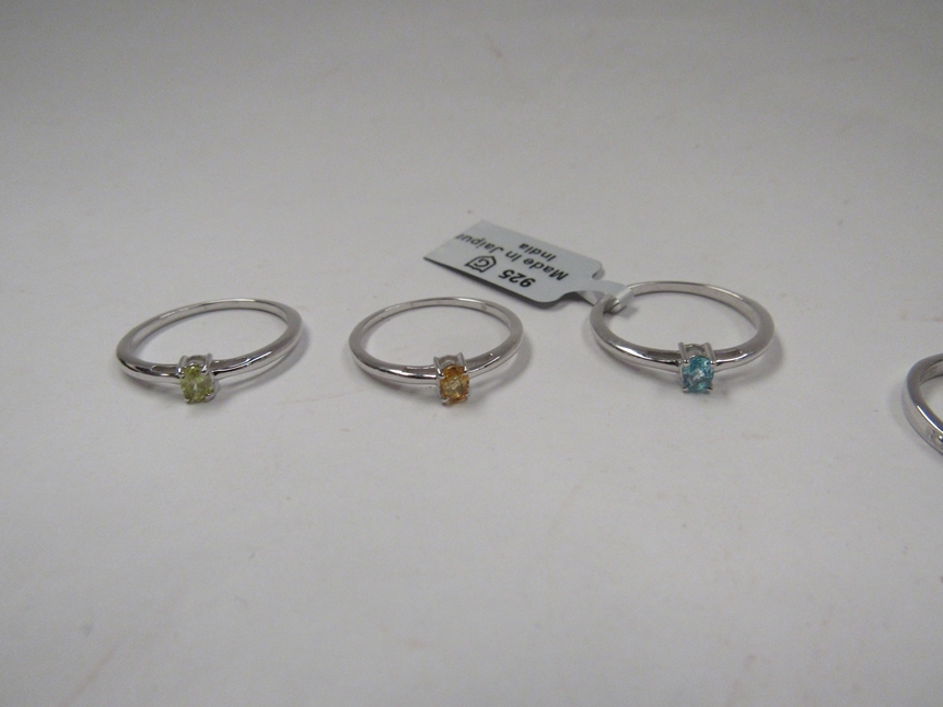 Six Sterling silver rings including Tanzanite, fire Opal, diamond, yellow sapphire, blue apatite and - Image 3 of 3