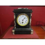 A late 19th/early 20th Century slate mantel clock with pendulum and key. 23.5cm tall