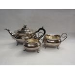 A silver plated three piece tea set comprising of teapot, milk jug and sugar bowl