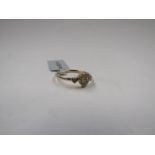A 9ct gold diamond heart ring, size N/O, 1.8g with certificate