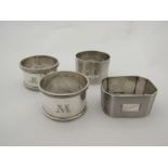 Five various silver napkin rings including engine-turned designs