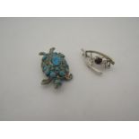 Two silver items including a brooch and turtle example