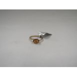 A 9ct gold ring set with Marialite, size J/K, 1.3g with certificate
