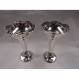 A pair of silver plated trumpet formed vases