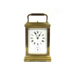 An F Clading, Bighton brass carriage clock, Roman numerals, with alarm with key,