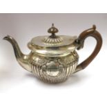 A 19th Century silver bachelor's teapot,