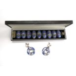 A Persian silver and enamel panel bracelet with matching earrings,