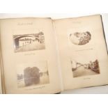 A Victorian photograph album containing approximately 130 albumen print and other mounted