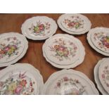 A part Copeland Spode dinner service with scalloped edges, decorated with floral bouquets. Some a/