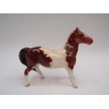 A Beswick Girls pony in Skewbald gloss, model no. 1483