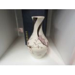 A Moorcroft Sakura pattern vase by Paul Hilditch, 21cm tall, boxed