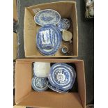 A quantity of blue and white tablewares, mainly Old Willow. Also a Carlton Ware cheese dish a/f