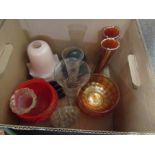 A box of glassware including carnival glass, three pink lamp shades, vases, etc