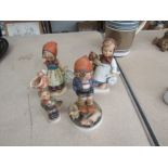 Four Goebel figures