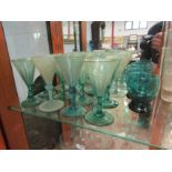 A collection of 19th Century and later green glasses