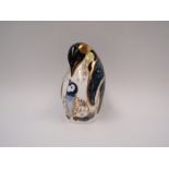 A Royal Crown Derby paperweight penguin with chick, gold stopper, boxed