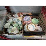 Two boxes of mixed teacups and saucers including monogrammed example, Minton's, etc