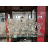 Ten heavy 19th Century glass sherry glasses and a set of four tall sundae glasses, some a/f