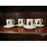 A set of four Rosanna - La Petite Black Dress Expresso cups and saucers