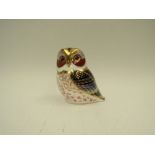 A Royal Crown Derby Tawny Owl paperweight commemorating 21 years of Royal Crown Derby