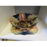 A Royal Doulton "Gnome" bowl with gilt decoration and a side plate (2), designed by Charles Noke