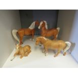 Three Beswick horses and a foal, palomino (one a/f)