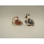 Two Royal Crown Derby paperweights, Swimming Duckling and Sitting Duckling, boxed