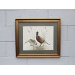 A framed and glazed print after John Morland depicting Pheasants. Pencil signed and in the print and