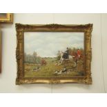 JOHN MUNNINGS (1916-1987) A framed oil on canvas, hunting scene, 'On The Scent'. Signed bottom